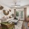Well-lit living room with ceiling fan