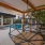 Resort-style swimming pool with lounge seating