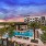 Resort-style swimming pool with lounge seating